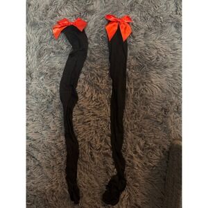 Thigh high nylon stockings with satin red bow